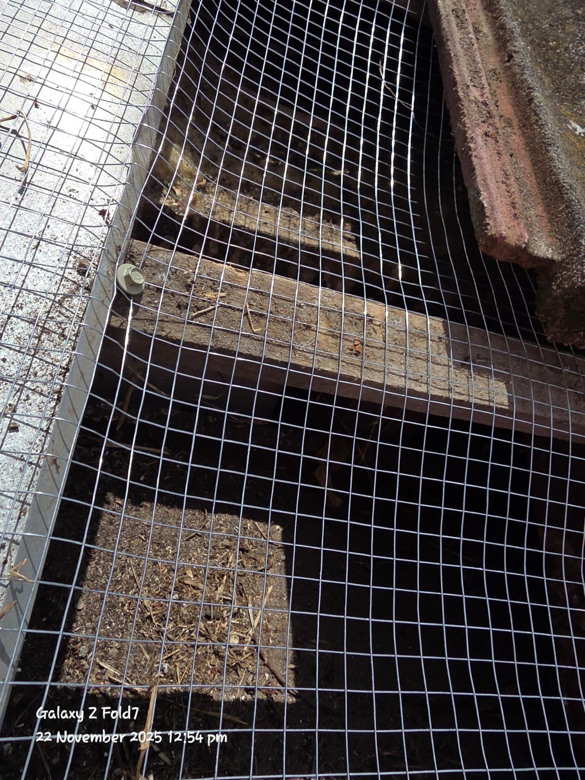 Possum proofing under roof tiles